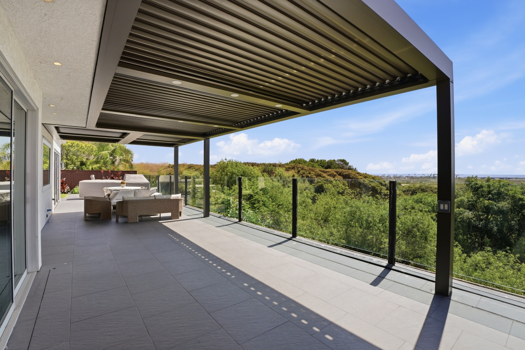 Covered patio with expansive outdoor view